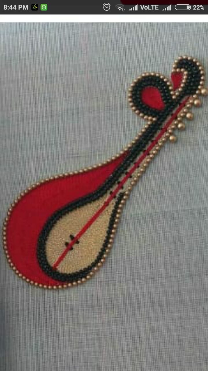 Intricate Embroidered Veena Motif with Embellishments